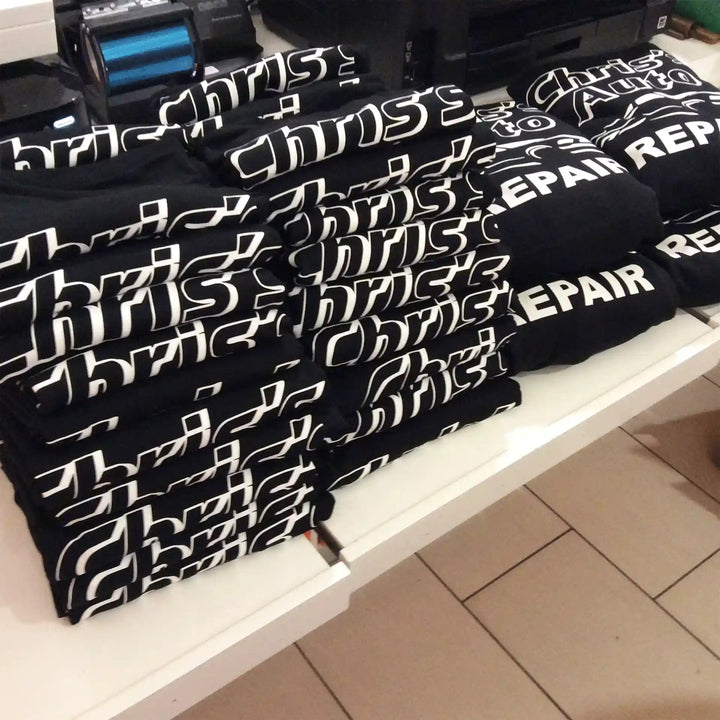 
                          Bulk_staff_shirts_printed_for_a_restaurant_team_with_matching_placement 