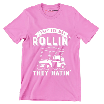 THEY SEE ME ROLLIN' THEY HATIN' - Golf Themed T-Shirt-Pink-S-Custom One Express